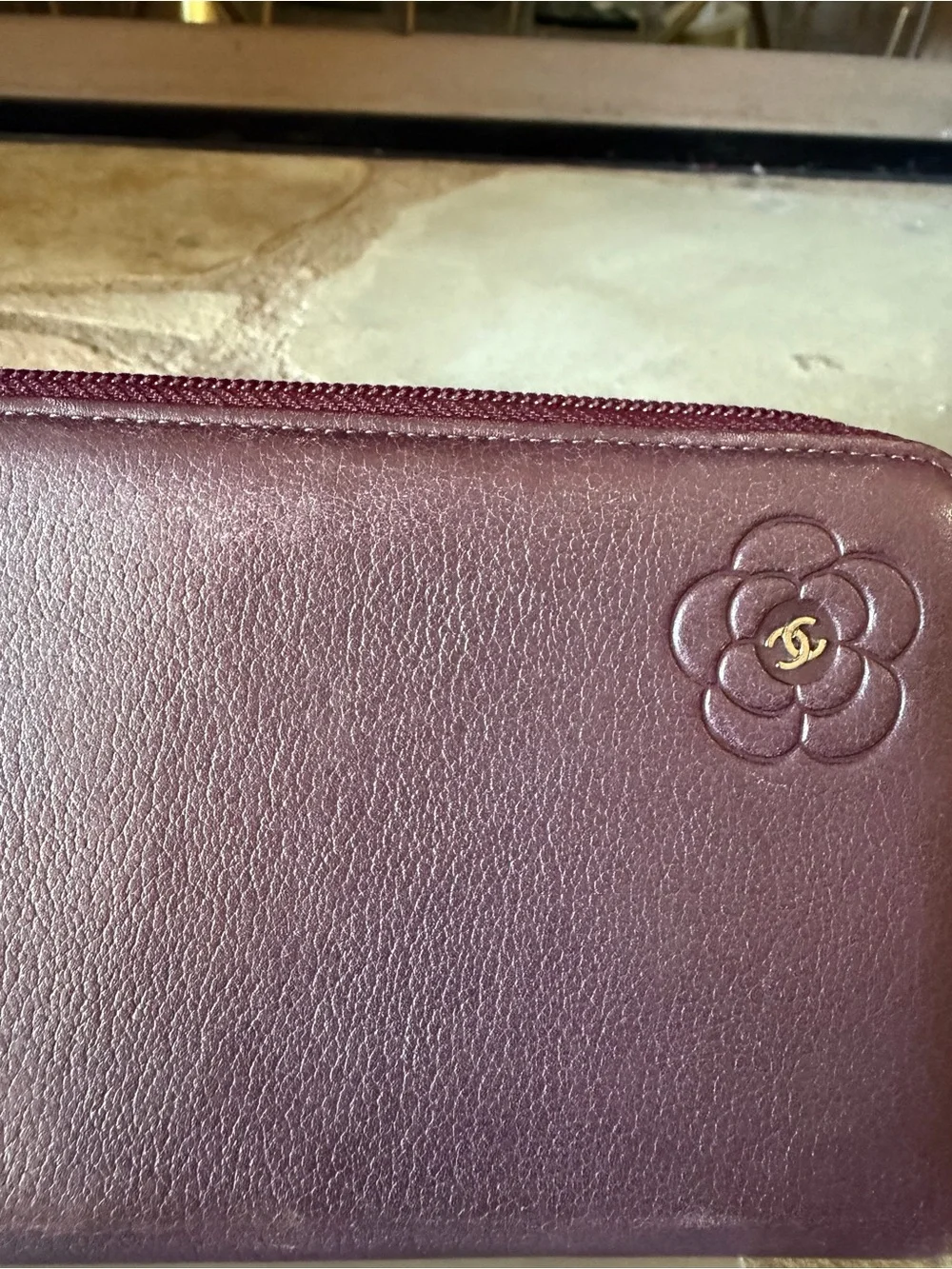 CHANEL Plum Camellia Zip Around Leather Wallet